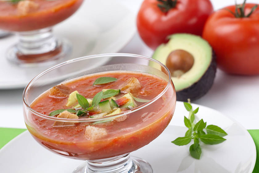 California Style Gazpacho with avocado in small serving glass cups