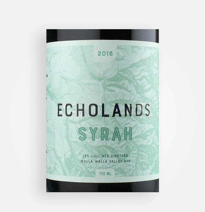 Front label close-up of 2018 Les Collines Vineyard Syrah wine from Washington's Walla Walla Valley
