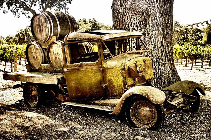 Old wine barrels in a truck