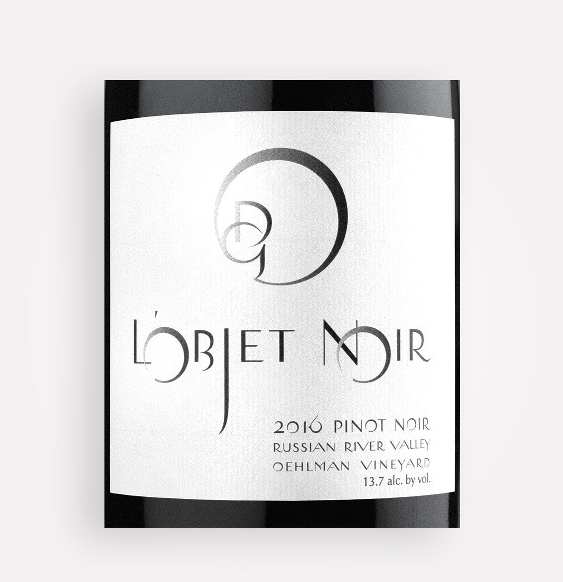 Front label close-up of L'Objet 2016 Oehlman Vineyard Pinot Noir wine from California’s Russian River Valley