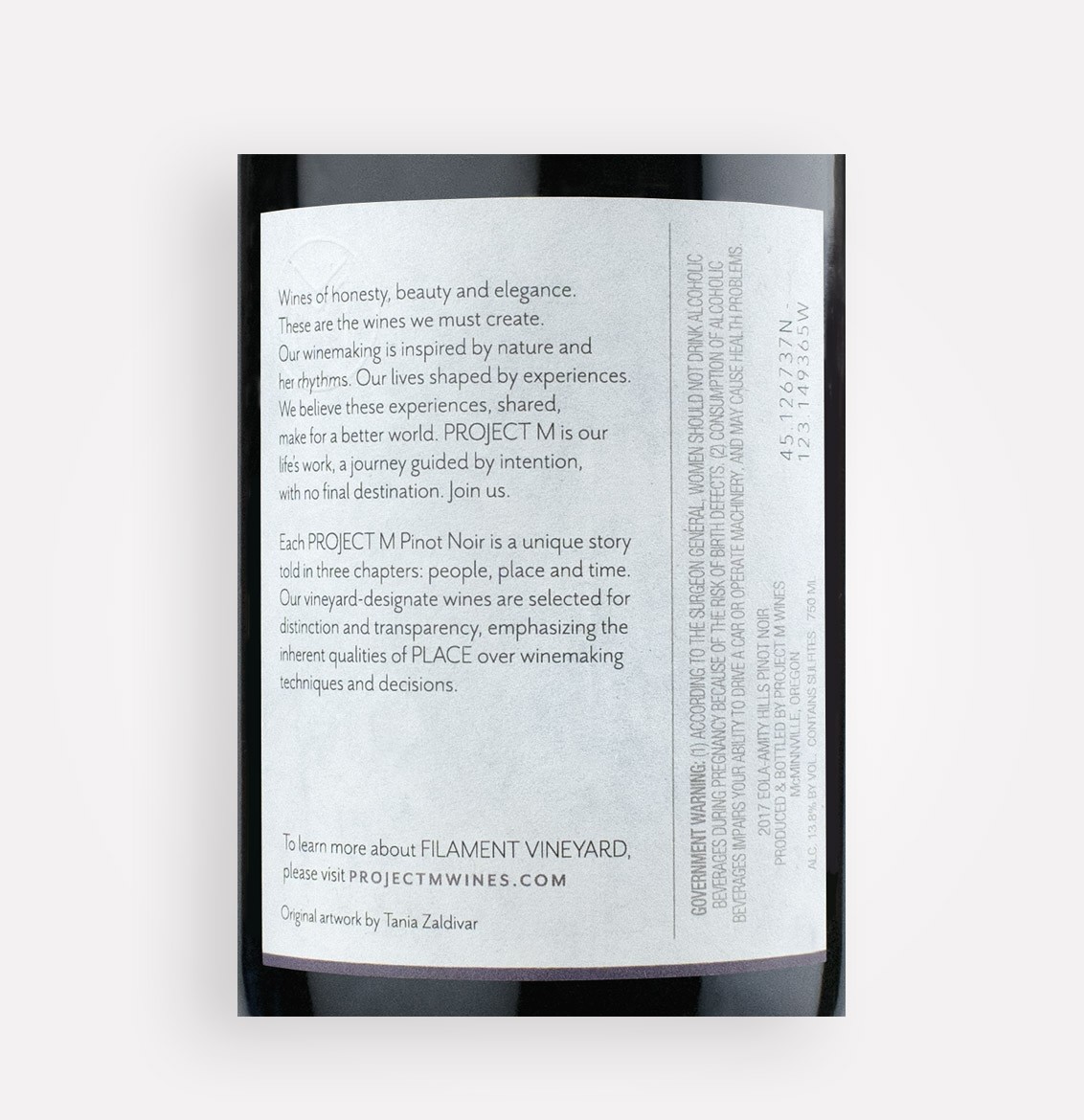 Back label close-up of Project M 2017 Filament Vineyard Pinot Noir wine from Oregon's Eola-Amity Hills