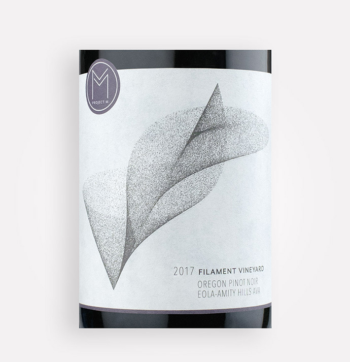 Front label close-up of Project M 2017 Filament Vineyard Pinot Noir wine from Oregon's Eola-Amity Hills