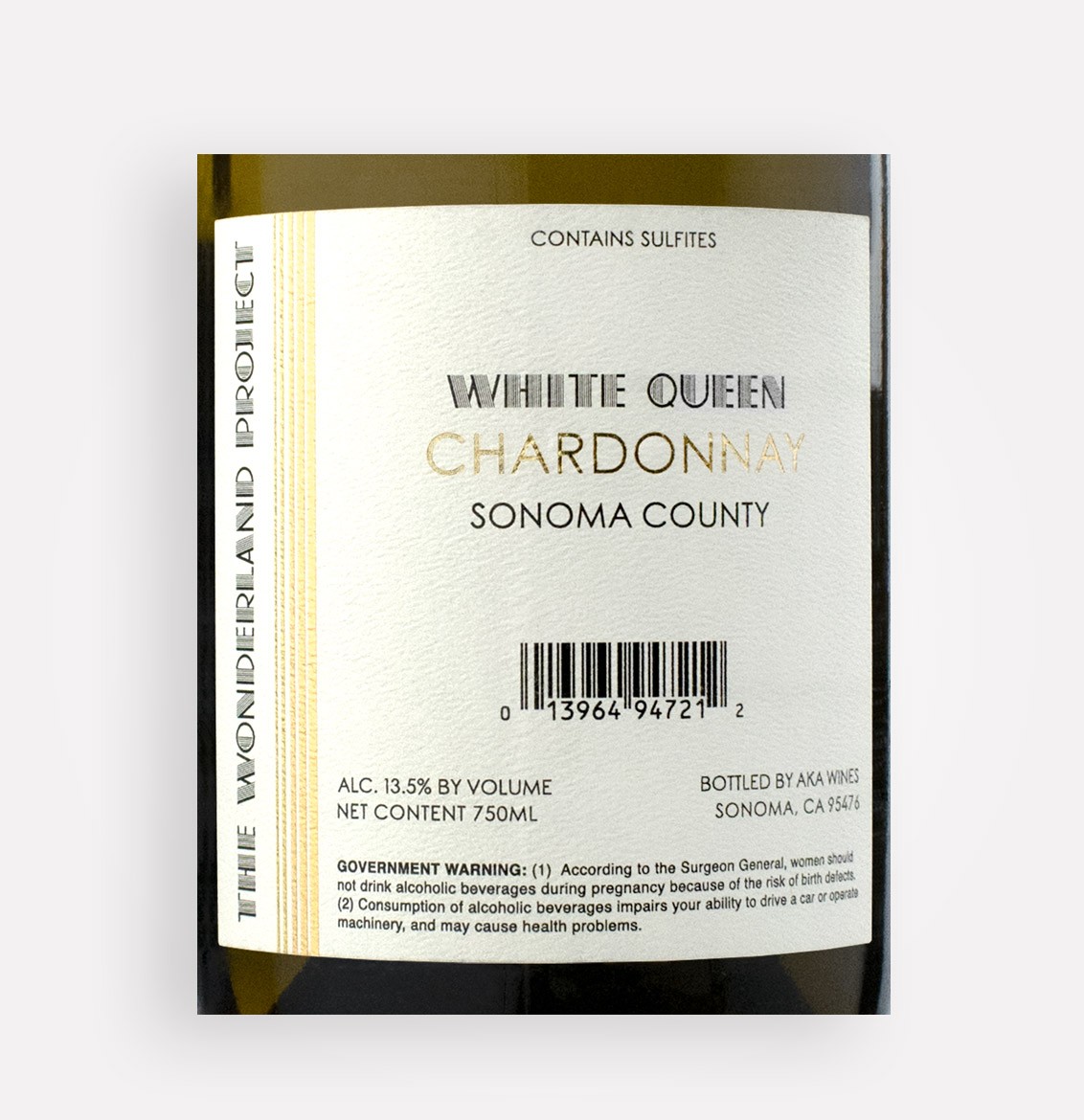 Back label close-up of The Wonderland Project 2017 White Queen Chardonnay wine from California’s Sonoma County